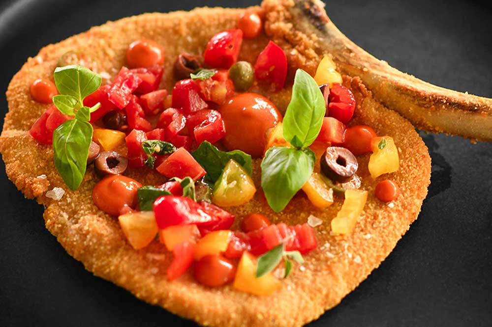 Cotoletta di Vitella alla Pizzaiola Cruda